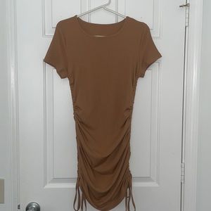 Tan ruched side fitted mini dress